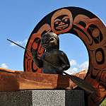 A first nations canoer is depicted in this copper sculpture just outside the Yukon Beringia Interpretive Center building.